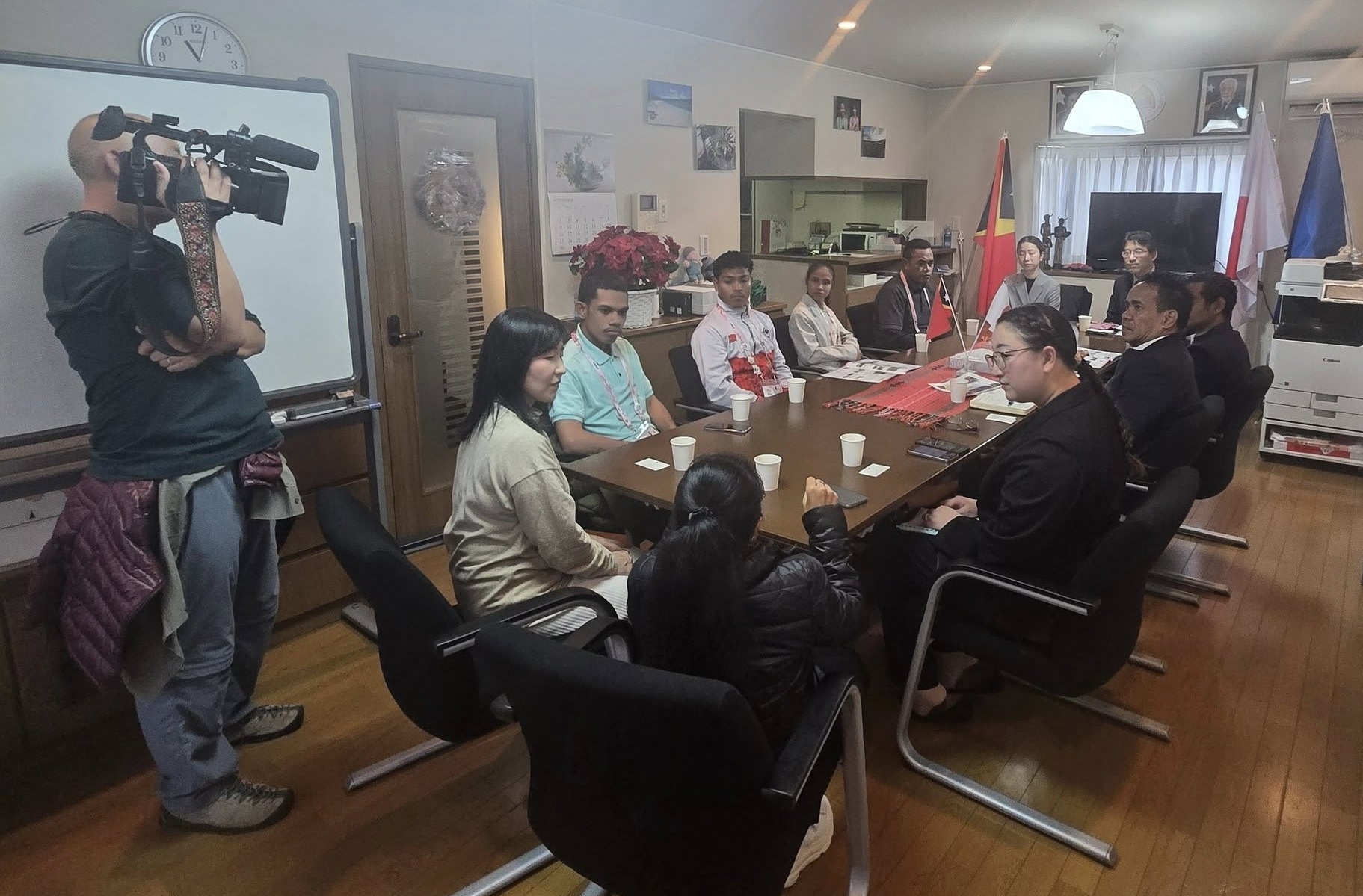 Group photo of Timor-Leste Deaf Olympics delegation, Nippon Foundation representatives, and Timor-Leste Embassy officials in Tokyo