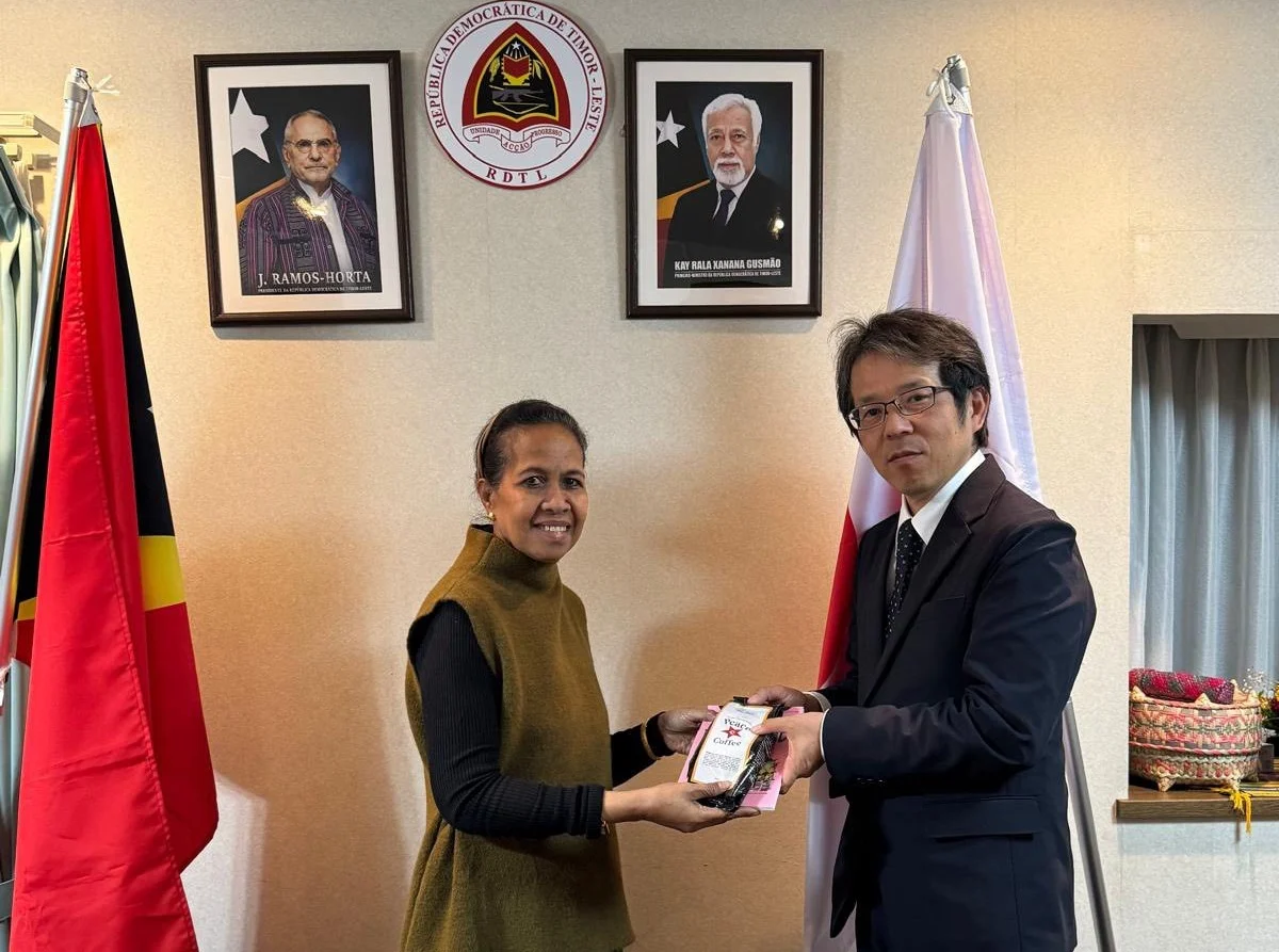 H.E. Ambassador Maria Terezinha Viegas and the OISCA delegation during a ceremonial presentation at the Timor-Leste Embassy in Tokyo.