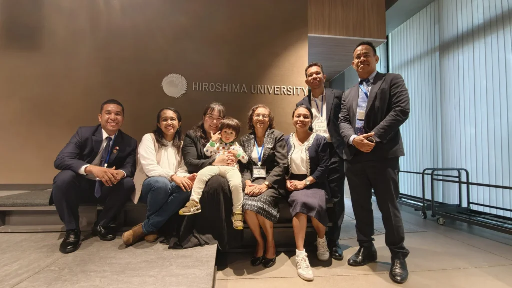 Group photo of the Timor-Leste delegation and participants at Hiroshima University.