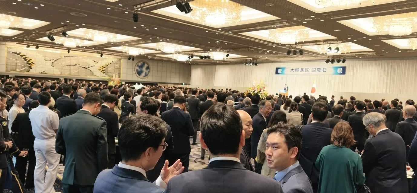 The grand reception hall filled with international guests attending the National Day event in Tokyo